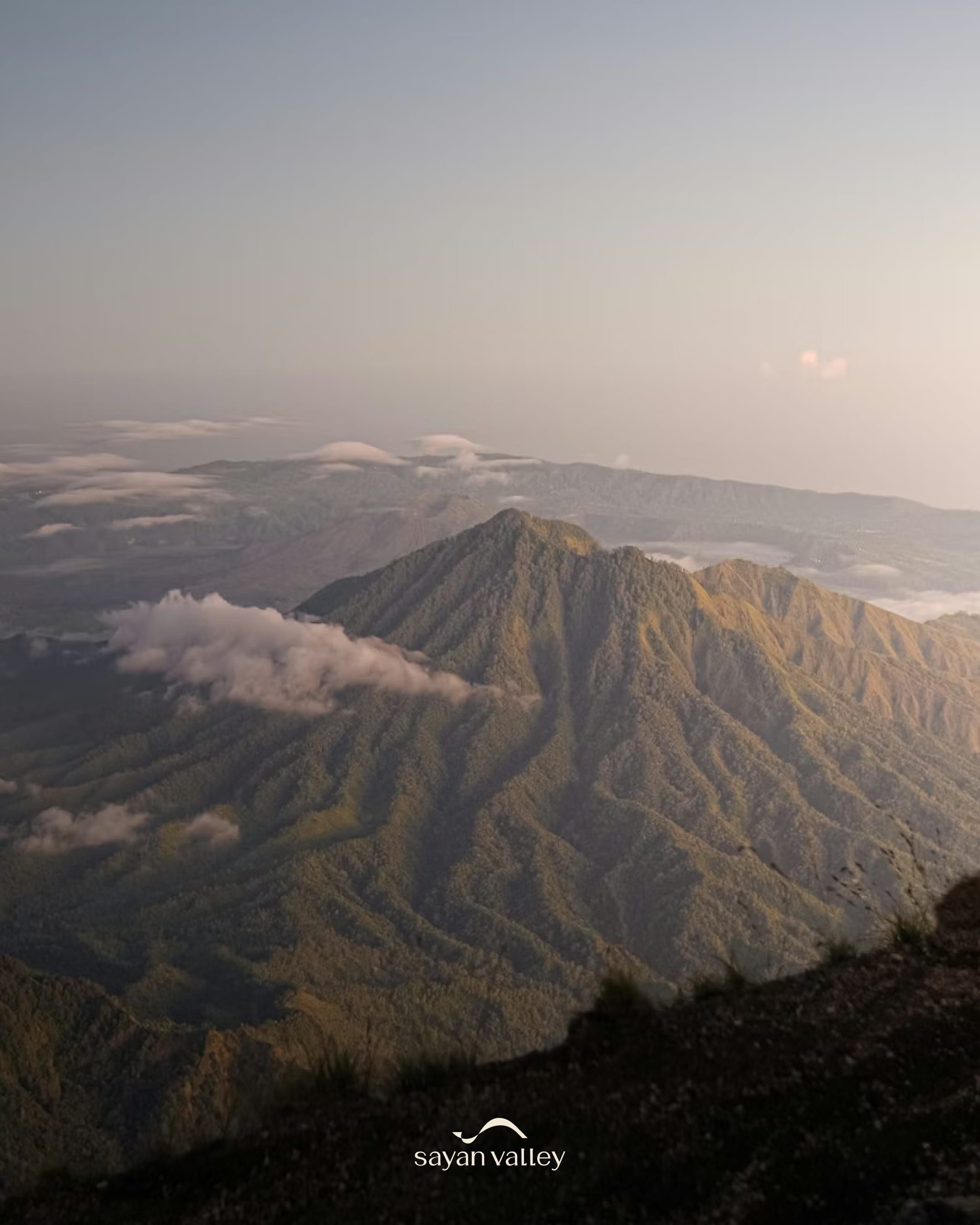 Scenic mountain peaks and lush greenery captured during the magical sunset time in bali.