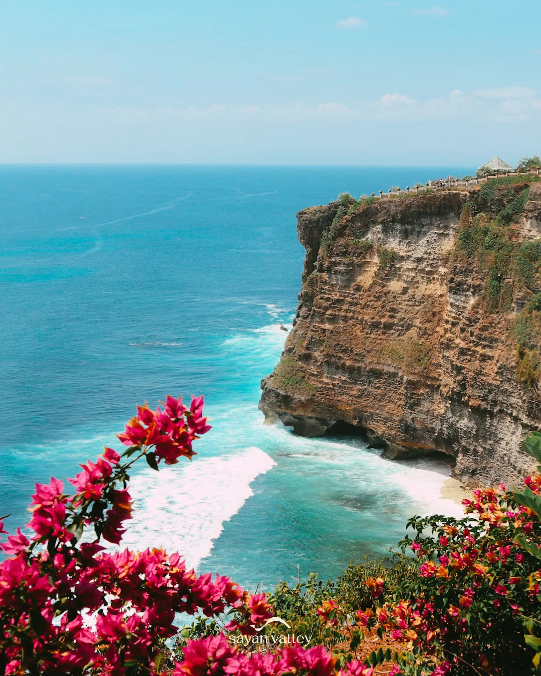 A breathtaking view of the sun dipping below the ocean horizon exactly at bali sunset time.