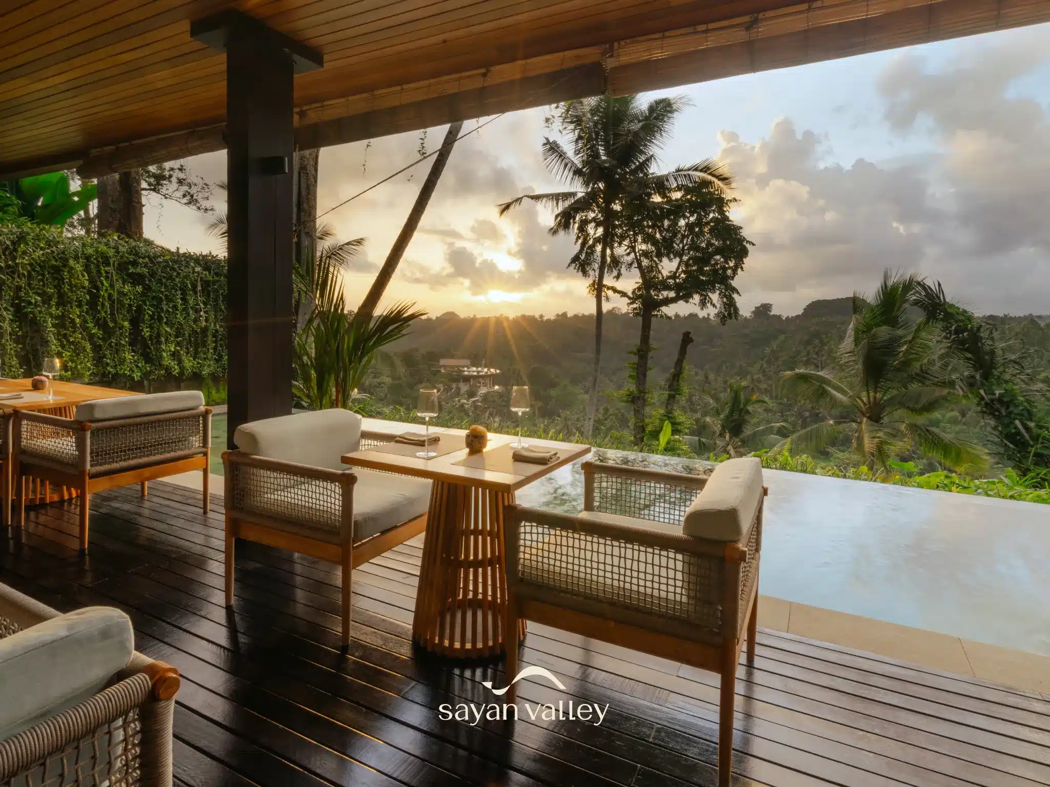 Sunset view from romantic dinner deck patio overlooking Ubud mountains